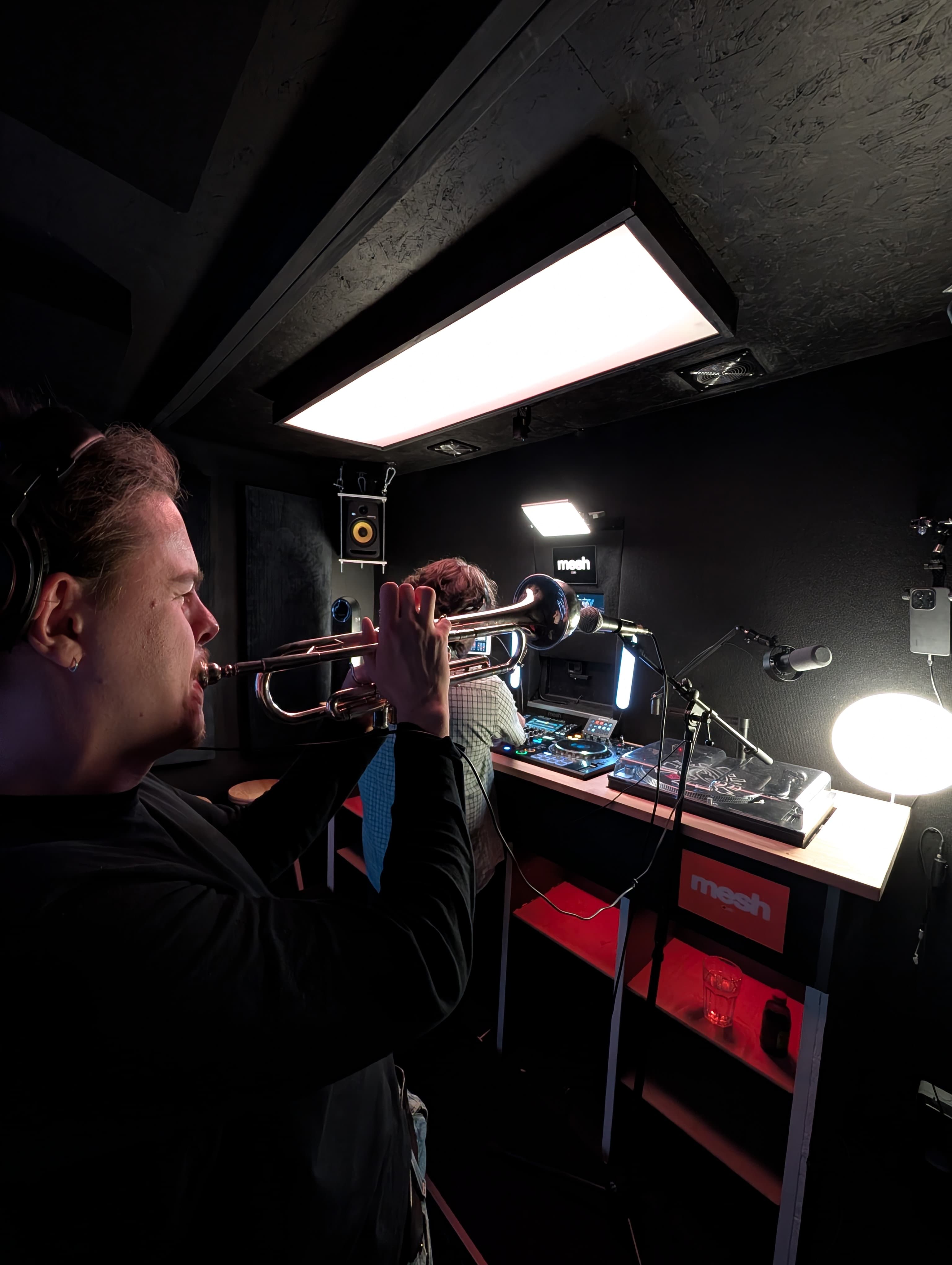 Live musician performing during a studio session